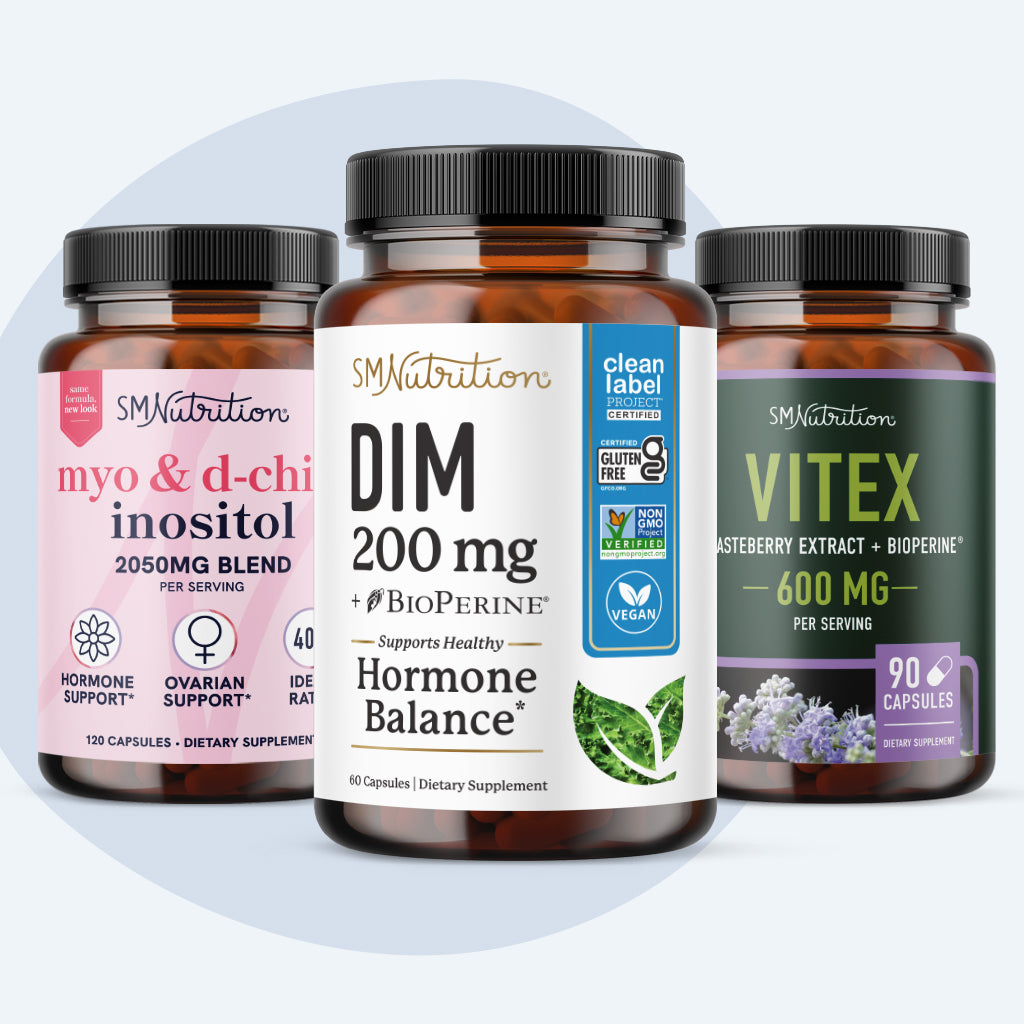 Three SM Nutrition supplement bottles on a light gray background